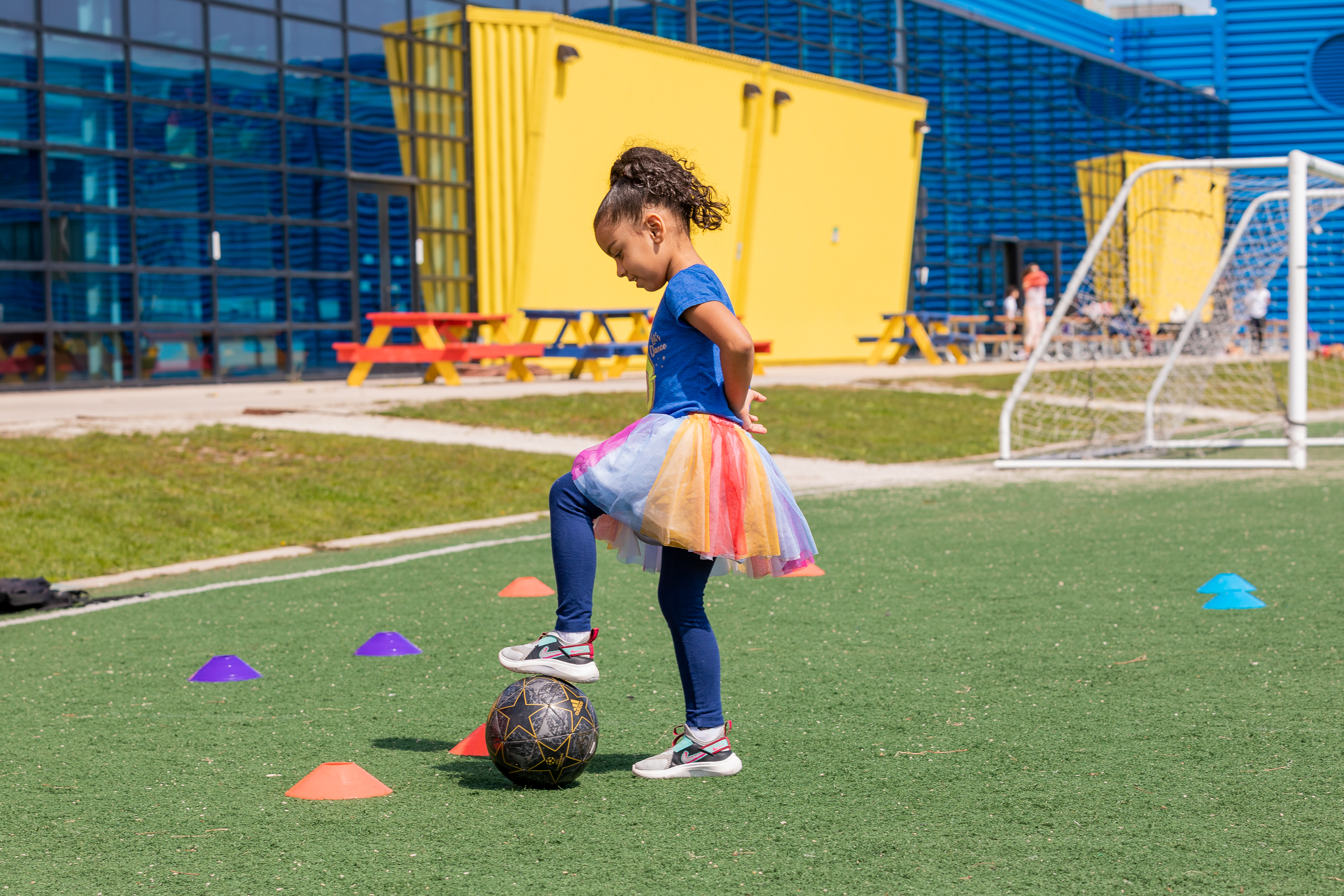 Girl playing soccer at Rauner Family Y